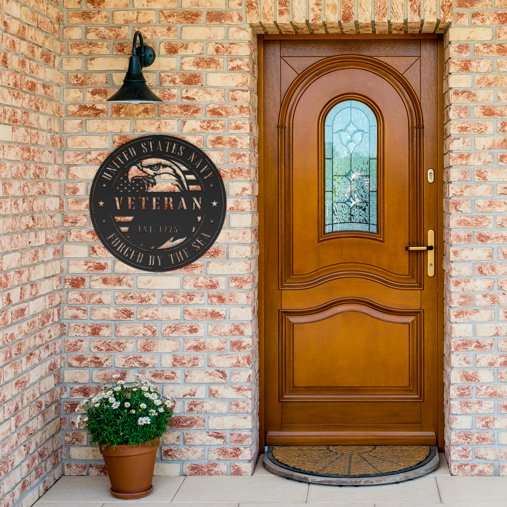 Navy_Veteran_Forged_By_Sea_Metal_Decor_Black_Brick_Entrance_Mockup.png_8427538