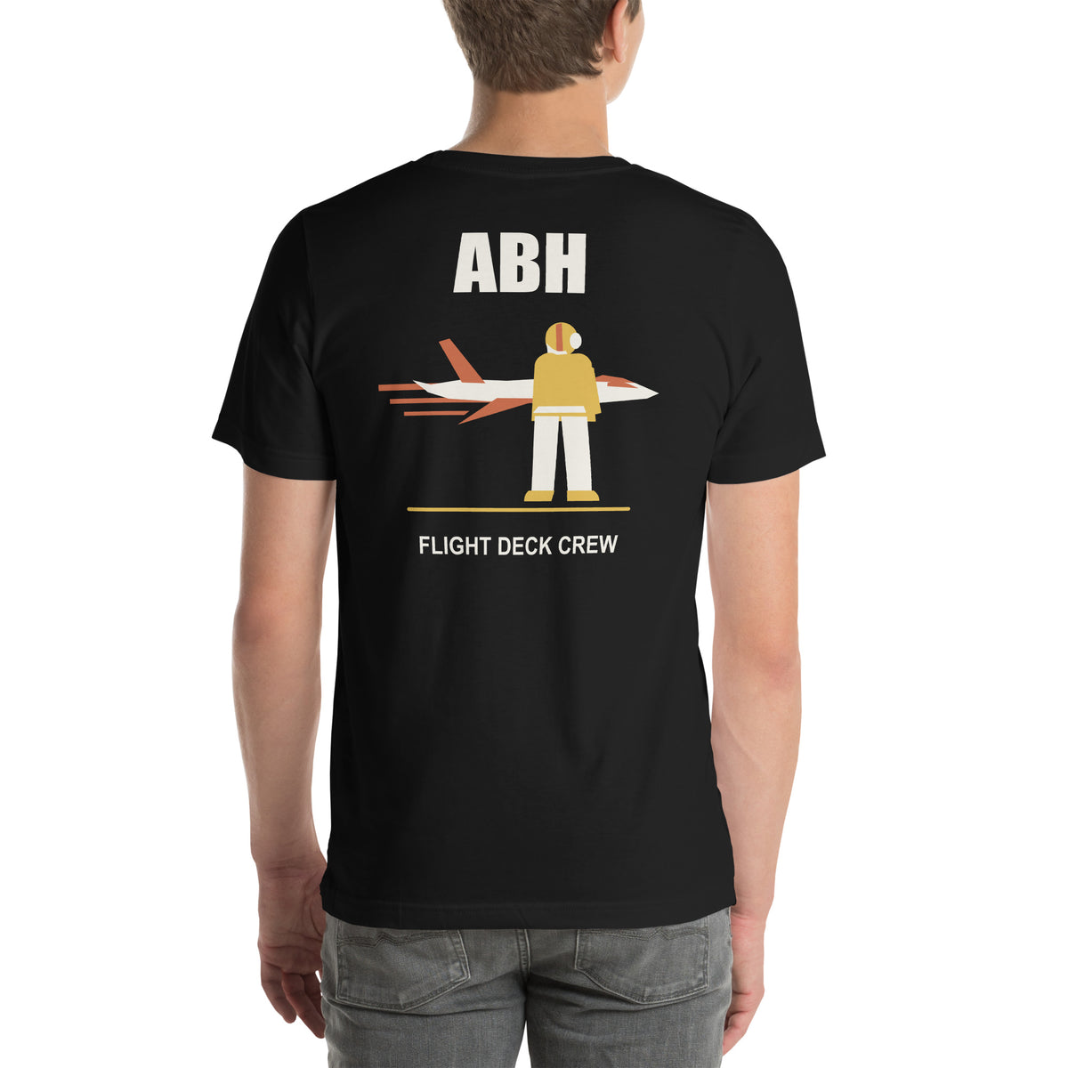Black ABH Flight Deck Motion T-shirt back showing a yellow shirt flight deck crew member and jet graphic